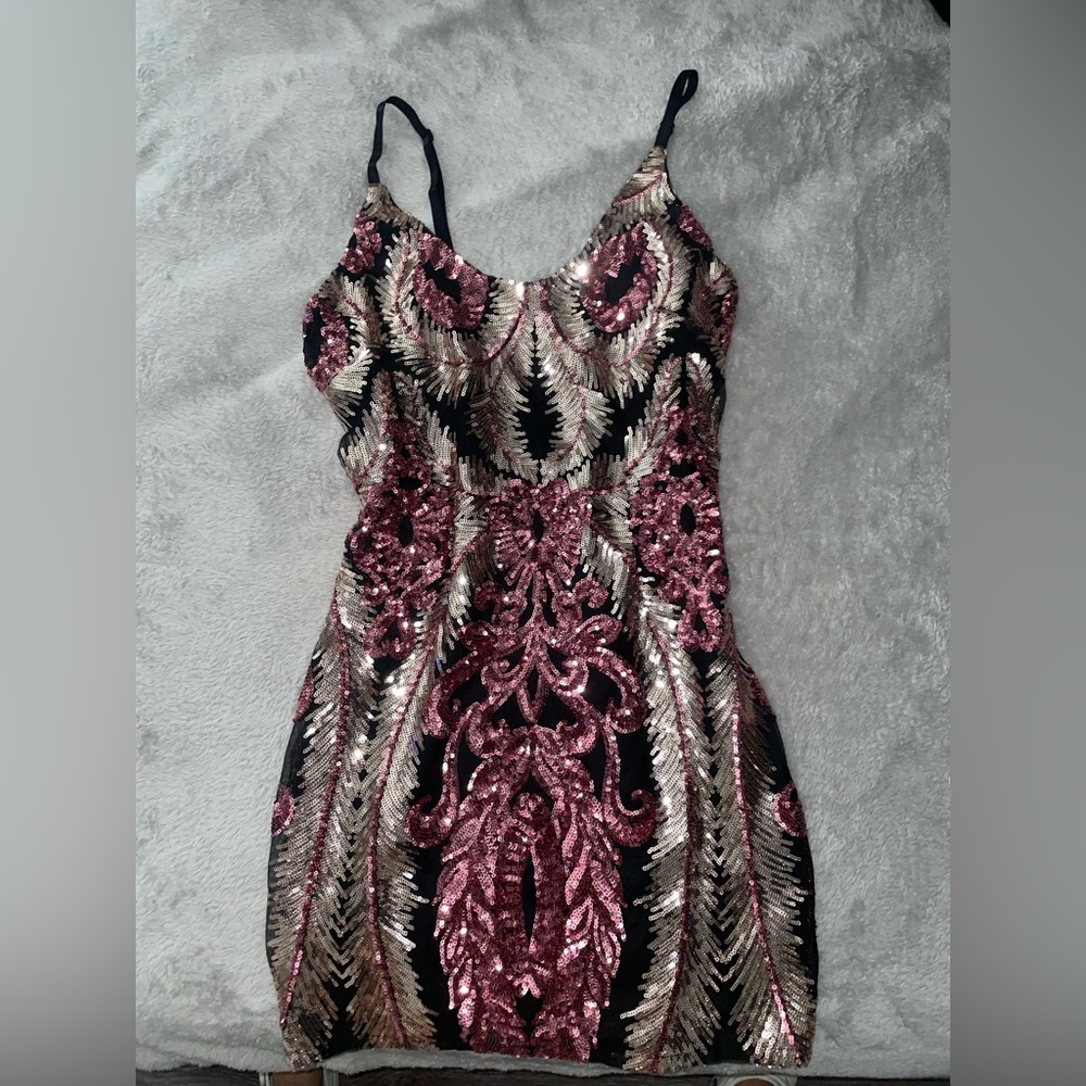 Super cute mini sequence dress. Perfect for night out it will make you stand out
